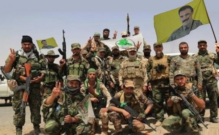 Federal polis güçlerinin anlaşmanın uygulanmasının bir adımı olarak Haşdi Şabi ve PKK’ye ait bayrak ve flamalar indirildi.